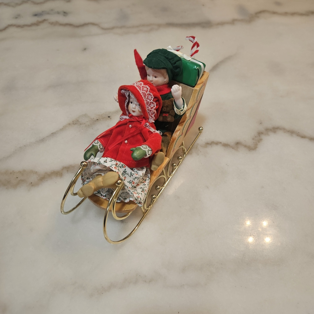 Festive Doll Sleigh Decoration